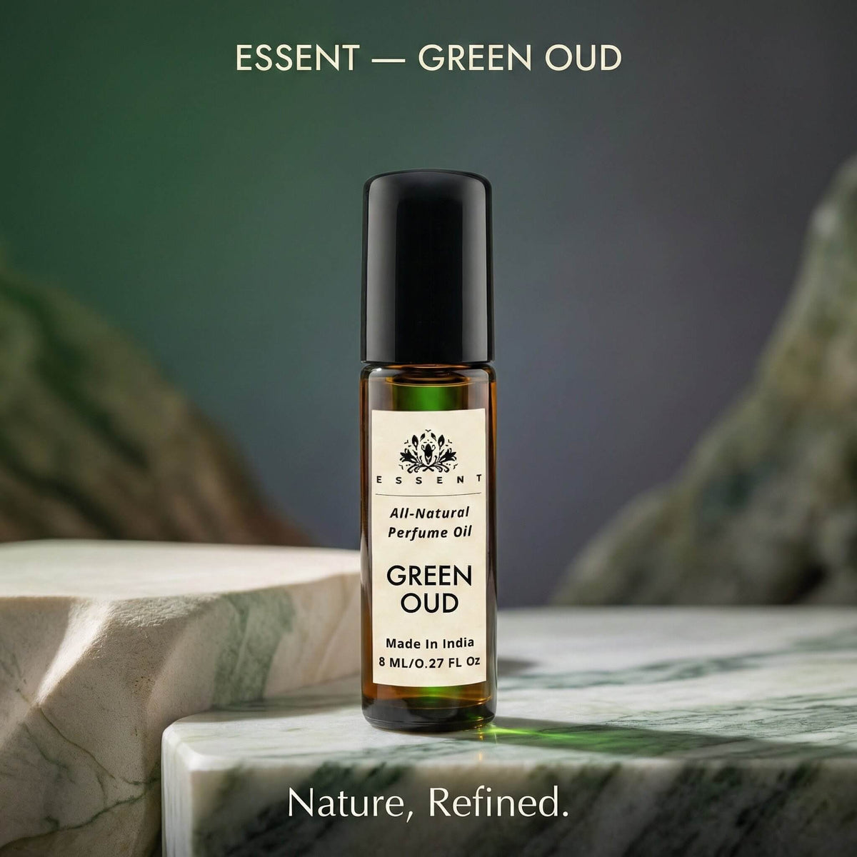 Essent Green Oud 8 ml roll-on attar bottle — oud & amber