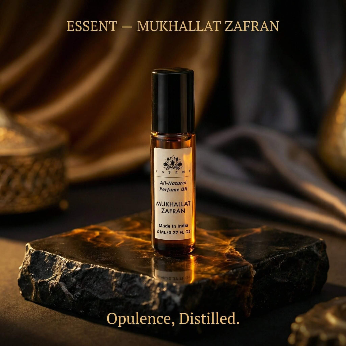Essent Mukhallat Zafran 8 ml roll-on attar bottle — oud & amber
