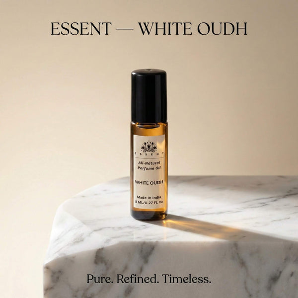Essent White Oudh 8 ml roll-on attar bottle — oud & amber